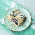 German crumb cake with blueberries on plate