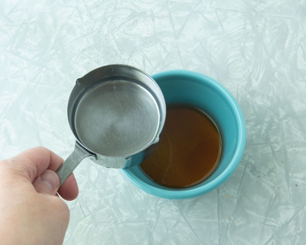 water and honey in small bowl