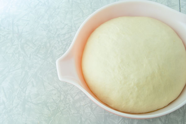 bread dough, doubled in size