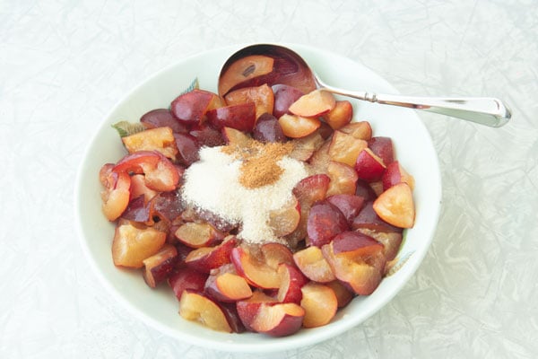plums cut in a bowl for easy plum jam