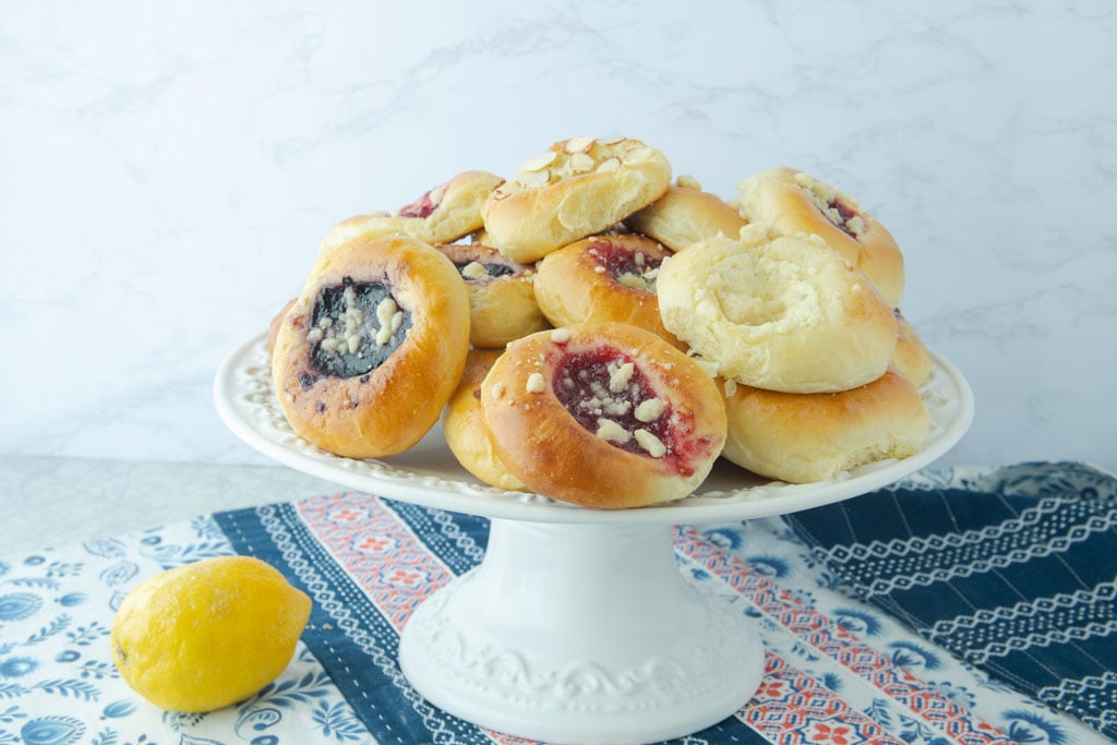 czech kolache on cake stand with lemon