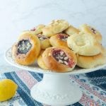 Czech kolache on cake stand with lemon