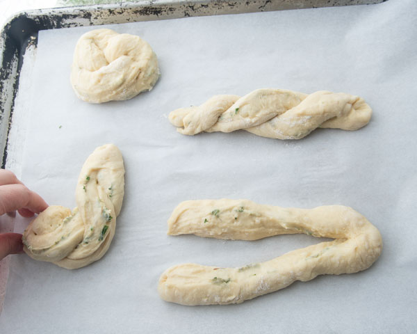 cut dough, twisting dough into a spiral