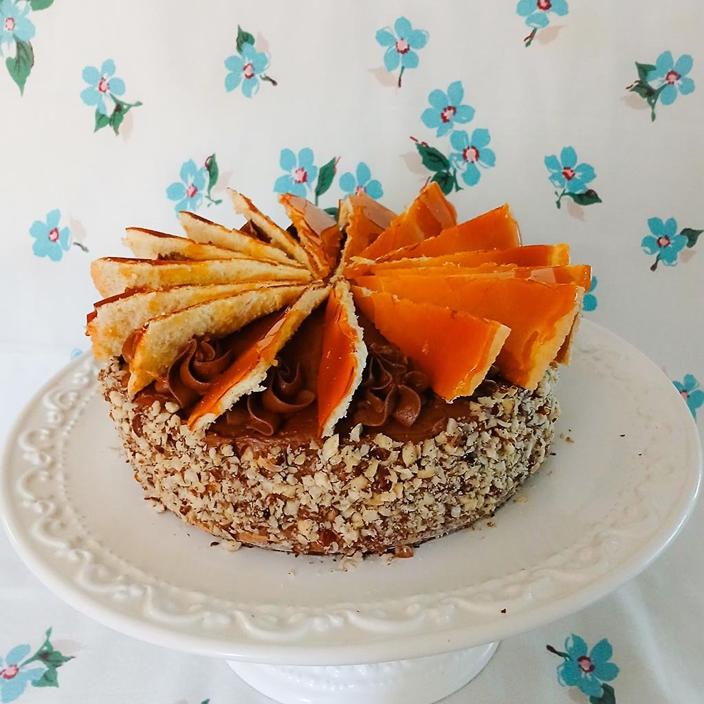 dobos torta on cake stand