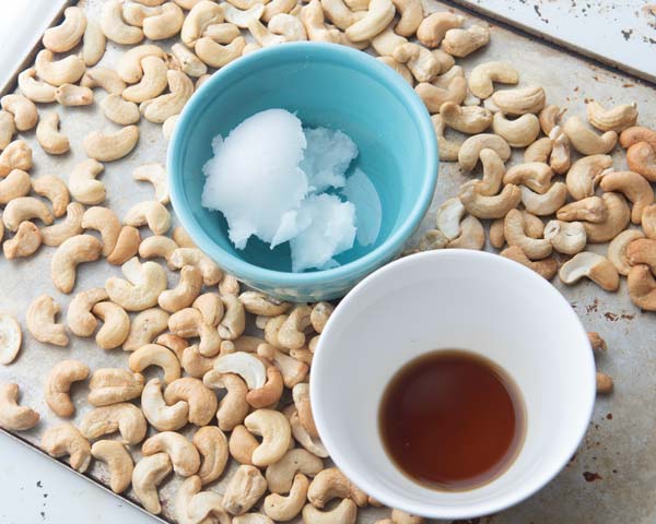 whole cashews, coconut oil and vanilla extract