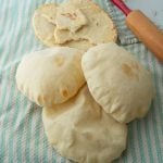 pita bread with rolling pin