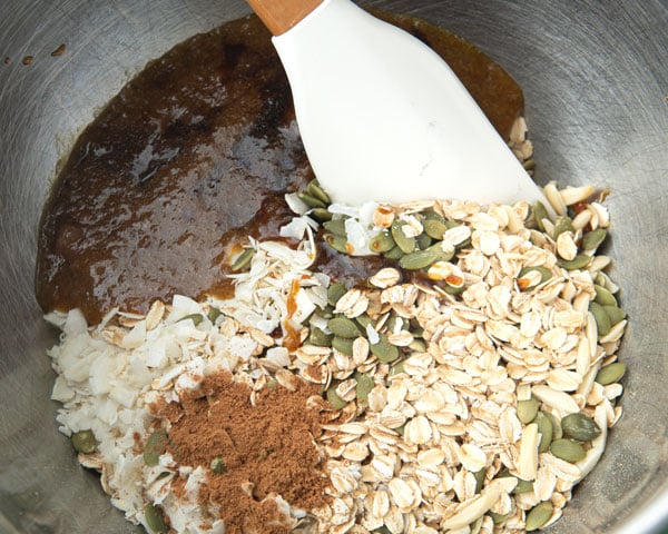 mixing applesauce granola ingredients