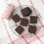 chocolate wafer cookies and cocoa tin