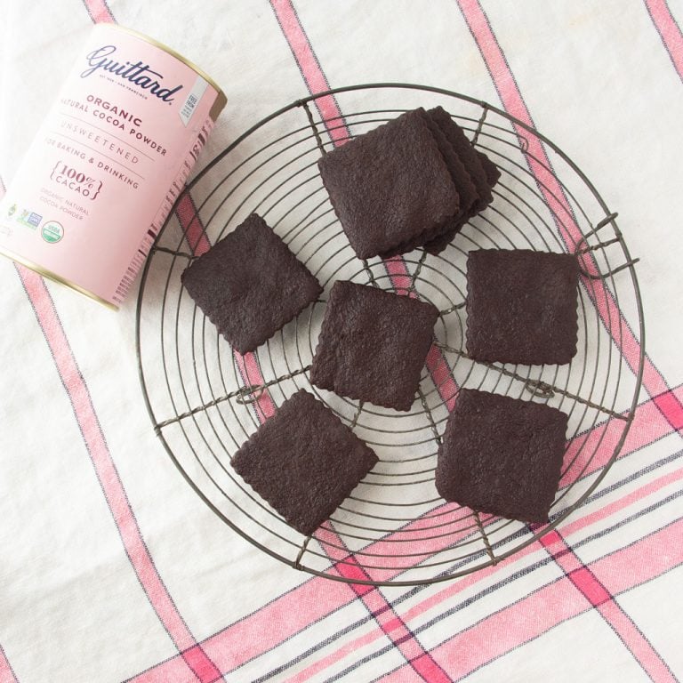 chocolate wafer cookies and cocoa tin