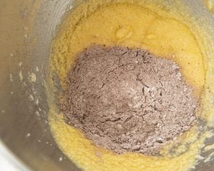 sifted cocoa added to butter and eggs