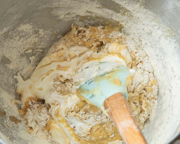 stirring sour cream into cake batter