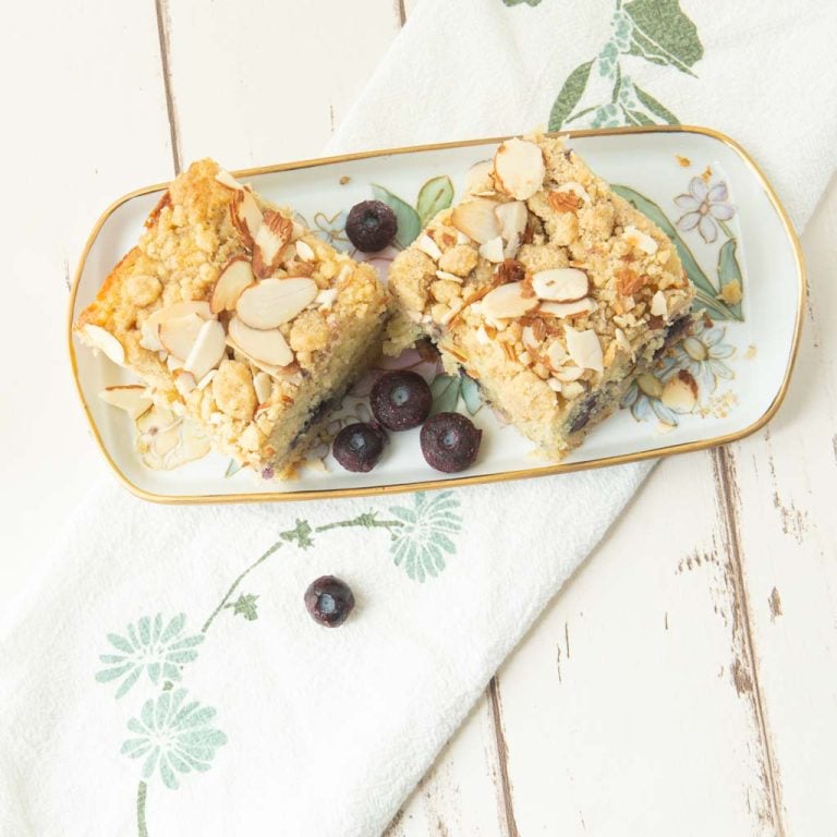 pieces of lemon blueberry snacking cake on plate