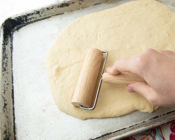 rolling out dough in sheet pan