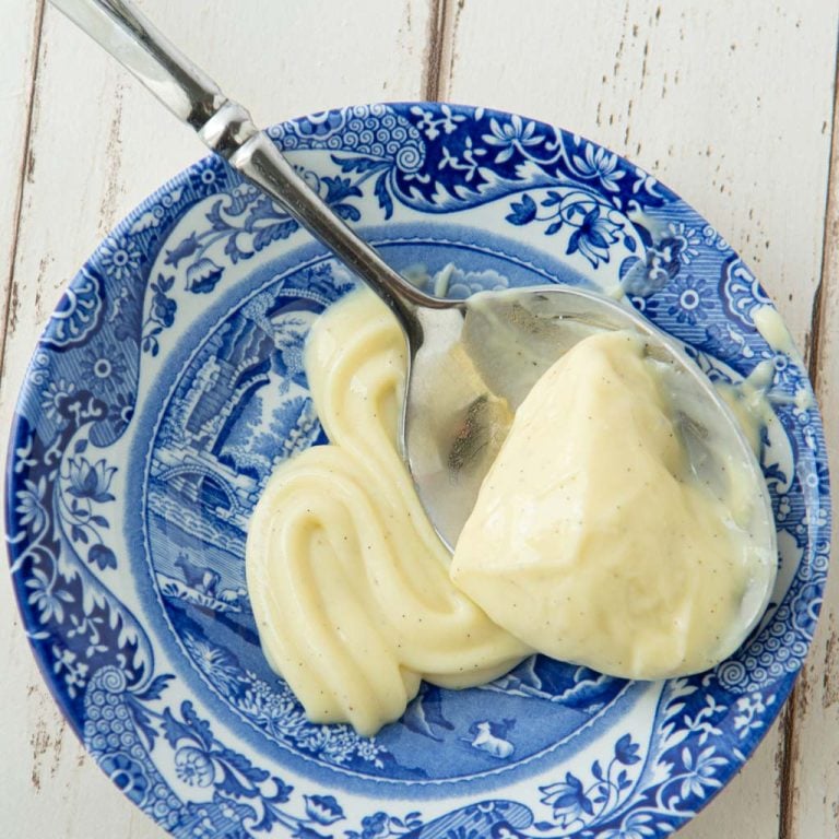 vanilla pastry cream on plate with spoon