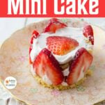 strawberry mini cake on teacup plate, text overlay