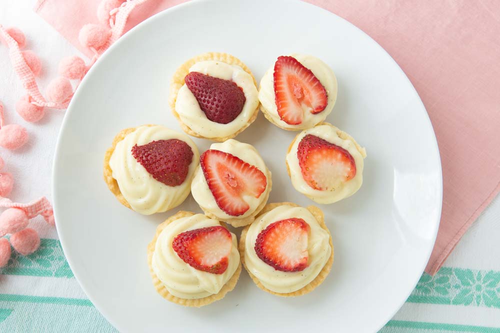 mini strawberry tarts on plate