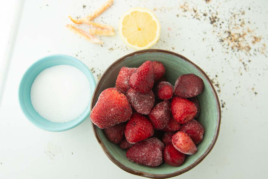 sugar, strawberries, candied orange and lemon half