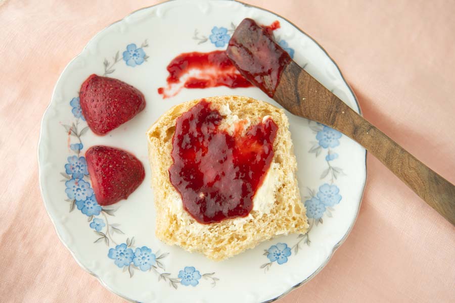 strawberry jam spread on roll