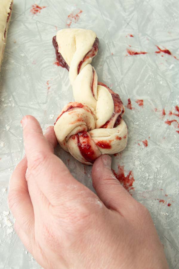 rolling twisted dough into spiral