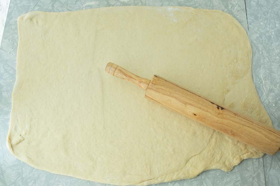 finish rolling overnight cinnamon rolls dough