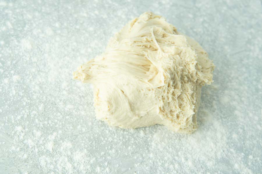 cold dough on floured surface