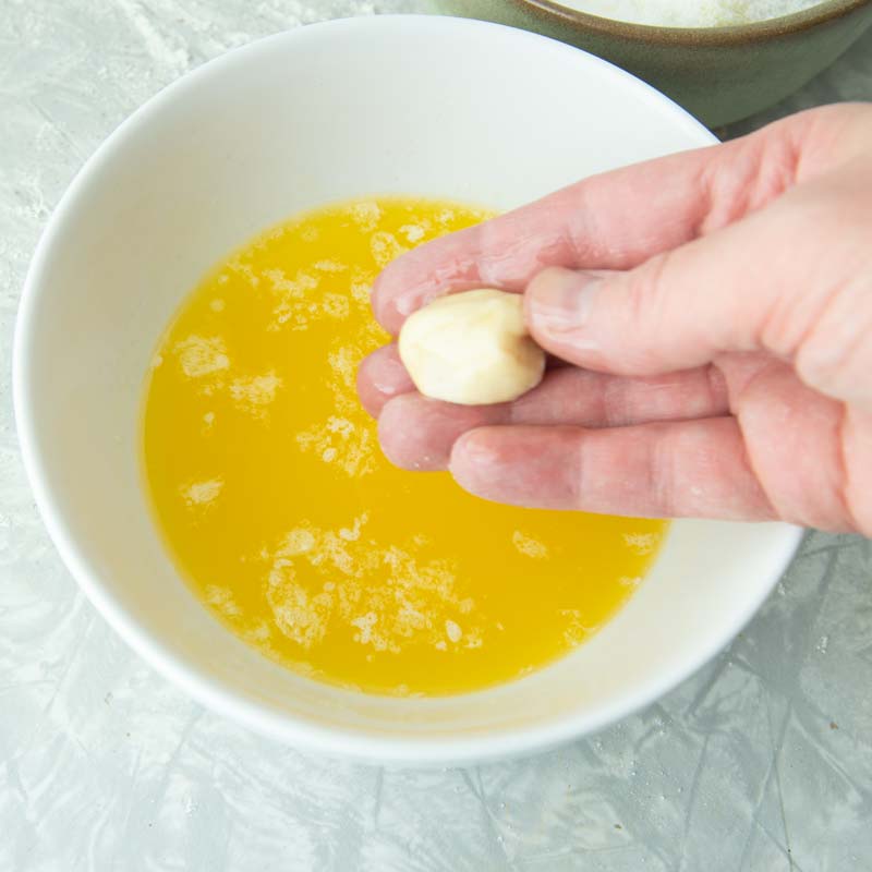 rolling dough in butter