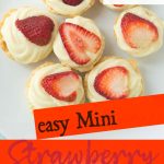 mini custard tarts with strawberries on plate with text overlay