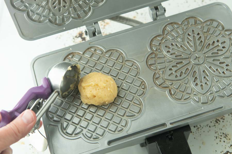 scooping batter onto pizelle iron