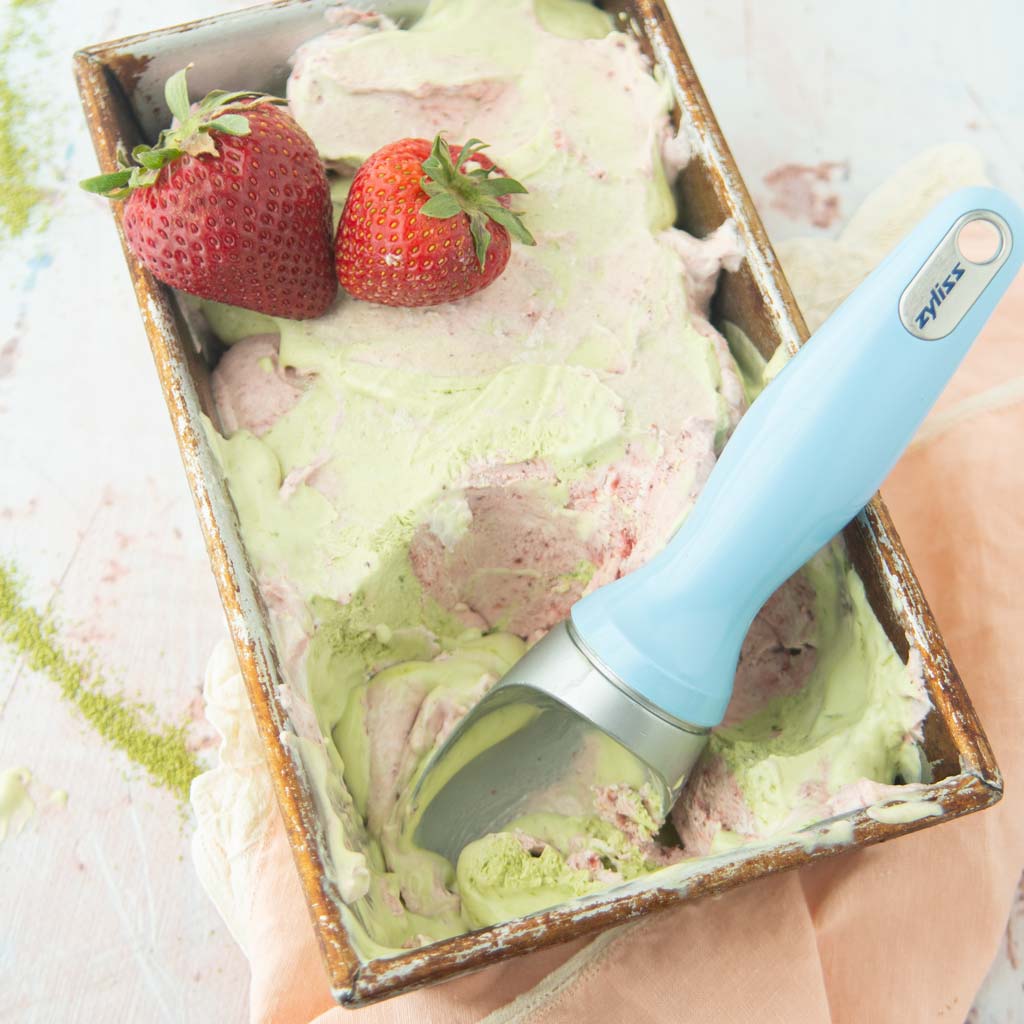 strawberry matcha no churn ice cream in loaf pan with scoop