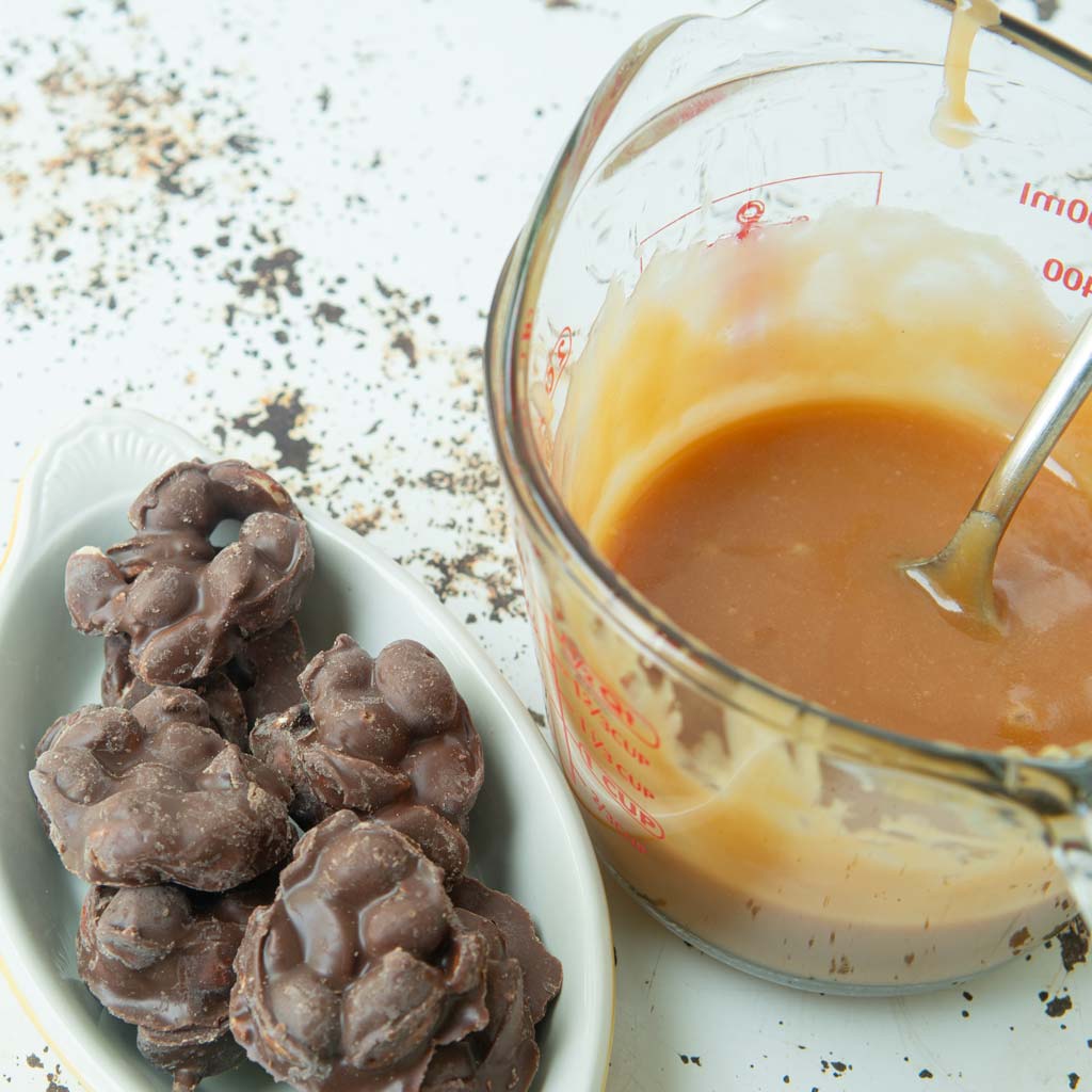 chocolate peanut clusters and caramel sauce