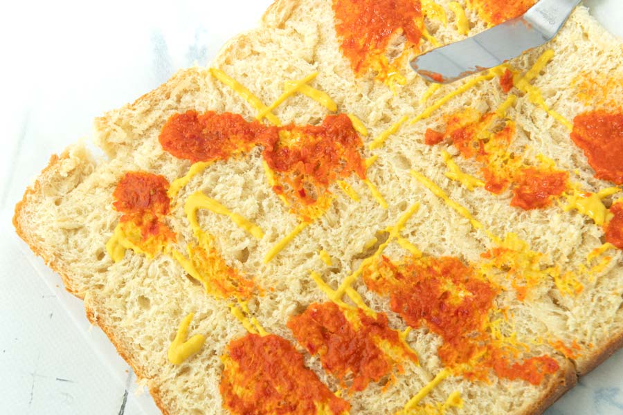 split rolls with mustard and avjar