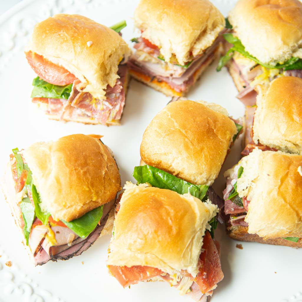 cut sandwiches on Hawaiian sweet rolls