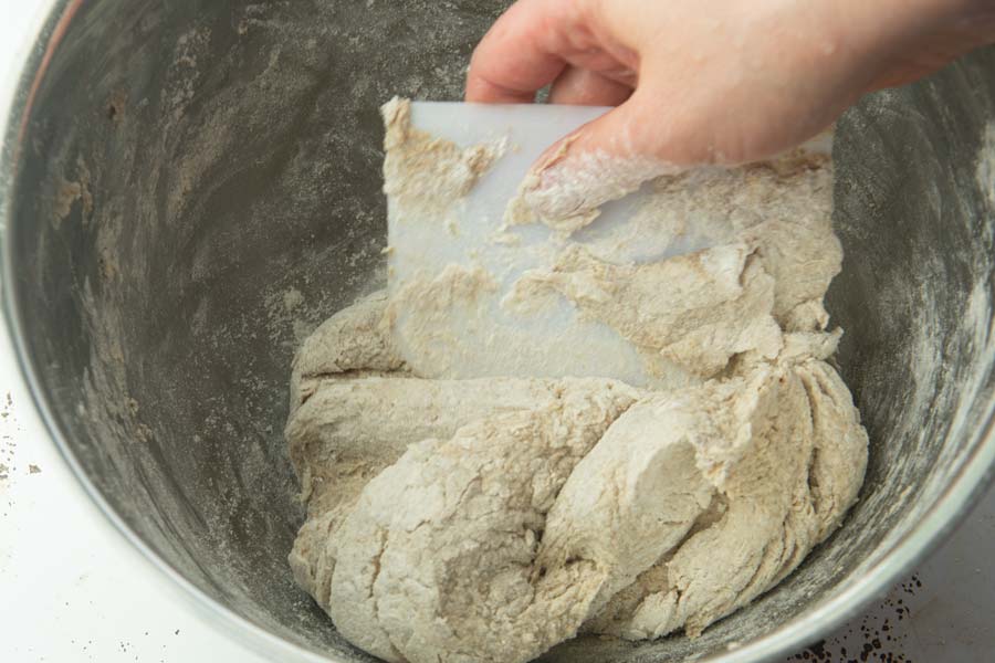 kneading rye dough with scraper