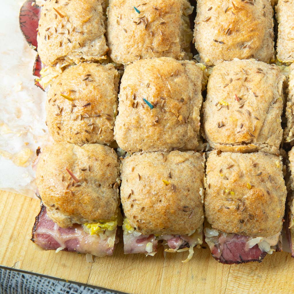 deli rye pan buns made into Reuben sliders