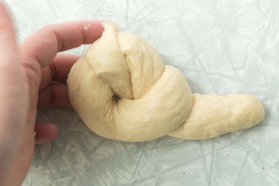 bringing dough end to back