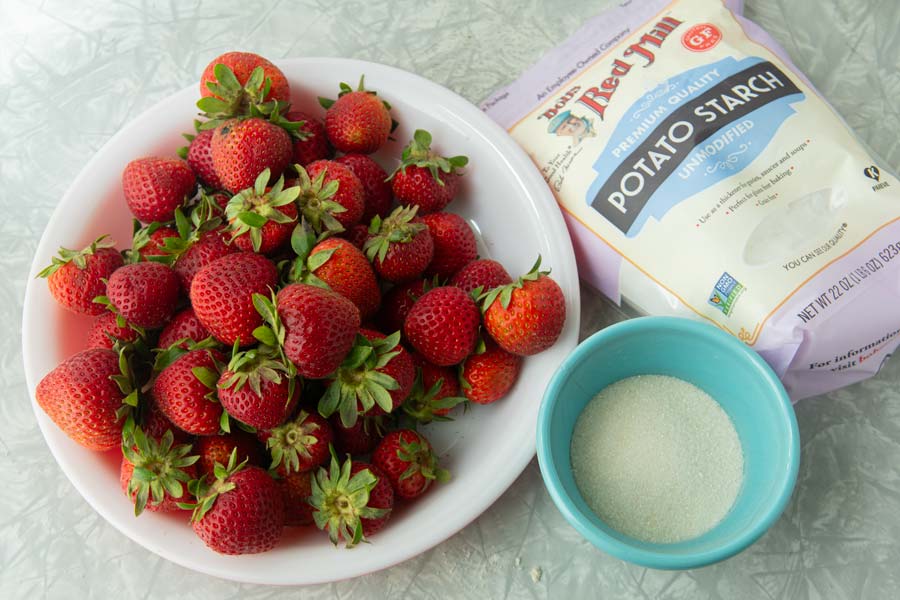 strawberries, potato starch, and sugar