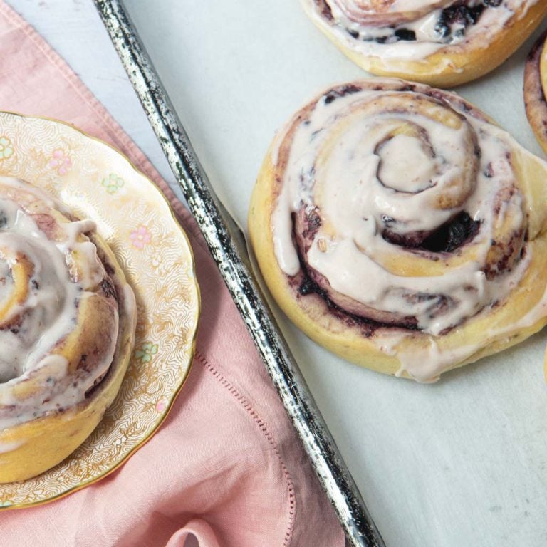 blackberry lime rolls on sheet tray and plate