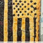 vertical shot of American flag pie with berries, text overlay