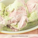 closeup of scoops of strawberry matcha ice cream in bowl, matcha strawberry ice cream in cones out of focus, text overlay