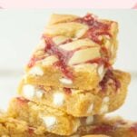 stack of strawberry white chocolate blondies, text overlay
