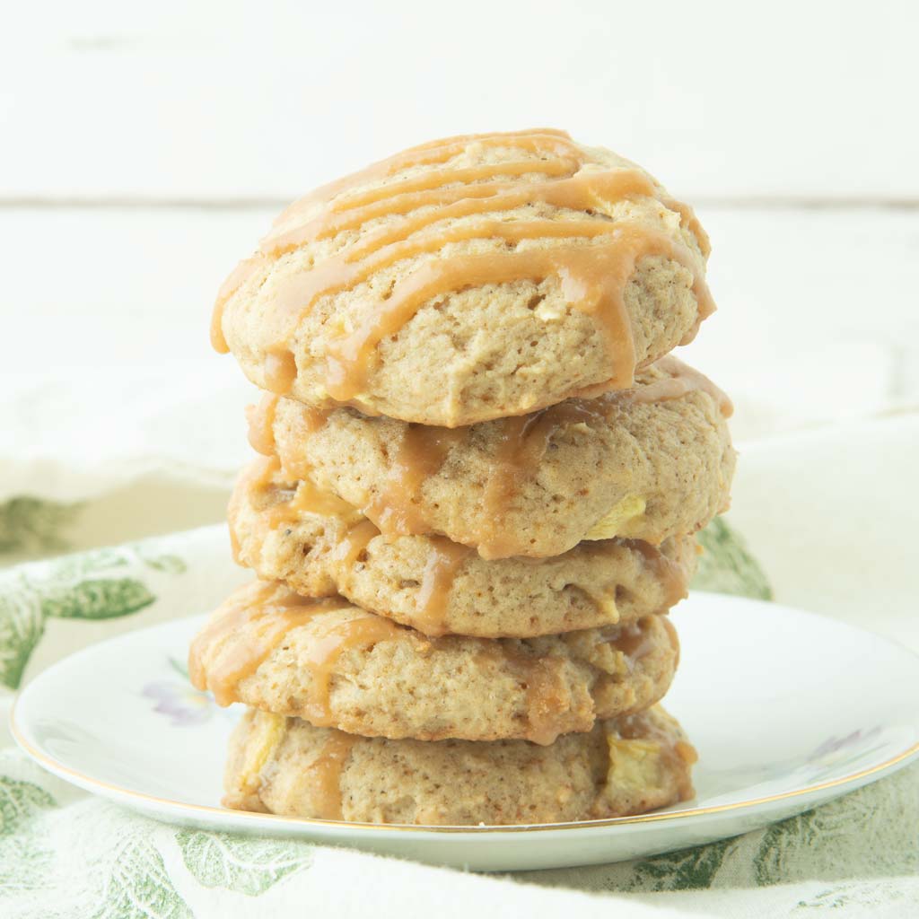 caramel apple cookies stacked on plate