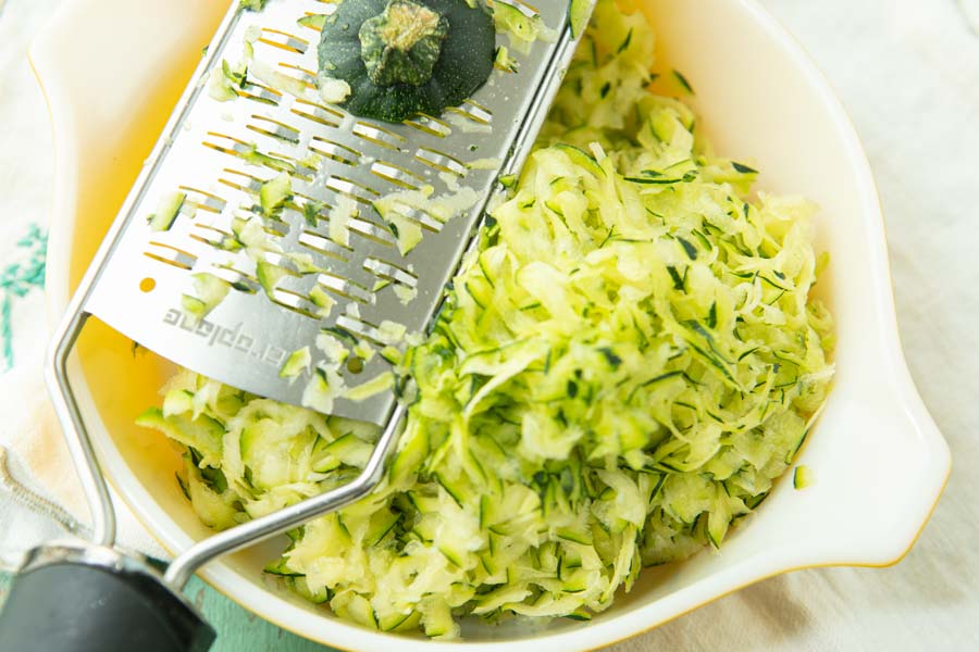grating zucchini on microplane