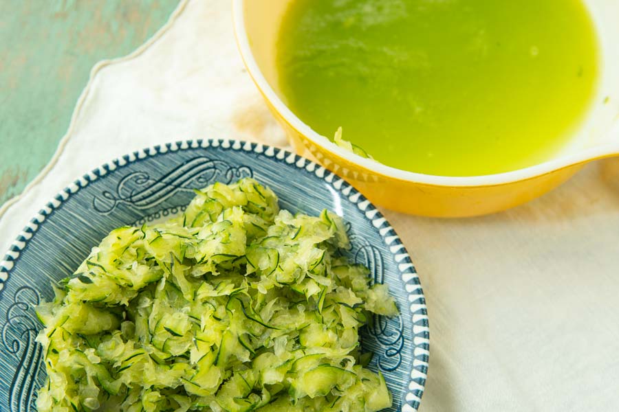 shredded zucchini after squeezing and zucchini juice