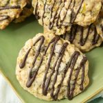 closeup of zucchini cookies drizzled with chocolate