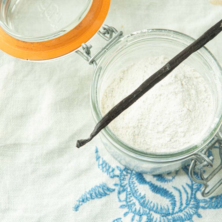 homemade vanilla sugar in glass jar with vanilla bean