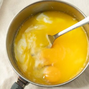 mixing butter, yogurt and eggs together