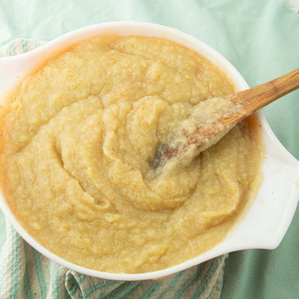 homemade applesauce in bowl with spoon