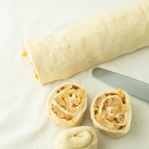 cut apple pie cinnamon rolls before baking