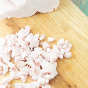 diced pork fat on cutting board