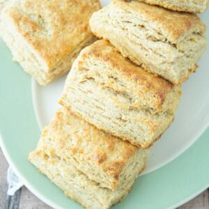 closeup of sour cream biscuits on plate
